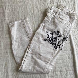 White jeans with floral details